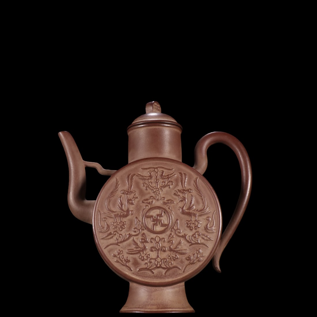 An Exquisite Purple Sands Phoenix Pattern Ewer: An Exquisite Purple Sands Phoenix Pattern Ewer Qing Dynasty, China Size:19cmx17.7cm (The Dimensions Of All Batches Are Manually Measured.If You Need More Detailed Information, Please Contact Our