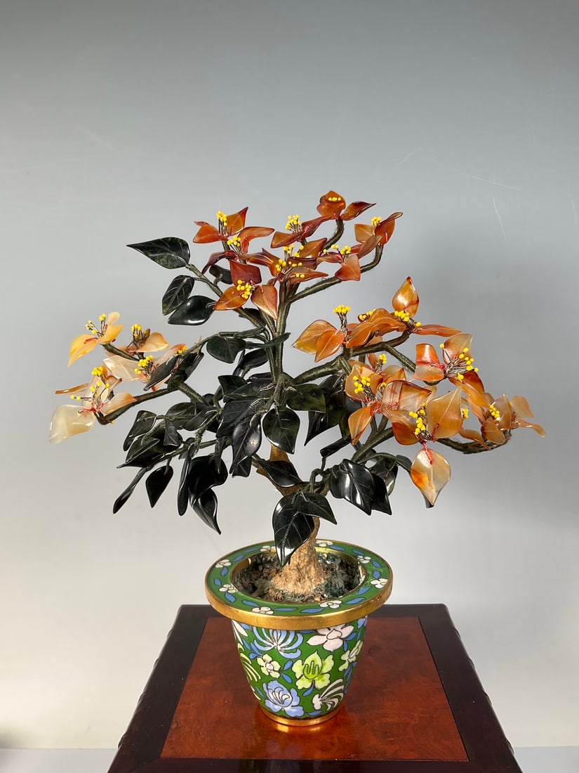 An Exquisite Cloisonne Inlaid Serpentine Jade Flower Pattern Bonsai: An Exquisite Cloisonne Inlaid Serpentine Jade Flower Pattern Bonsai Qing Dynasty, China Size:24cm (The Dimensions Of All Batches Are Manually Measured.If You Need More Detailed Information, Please