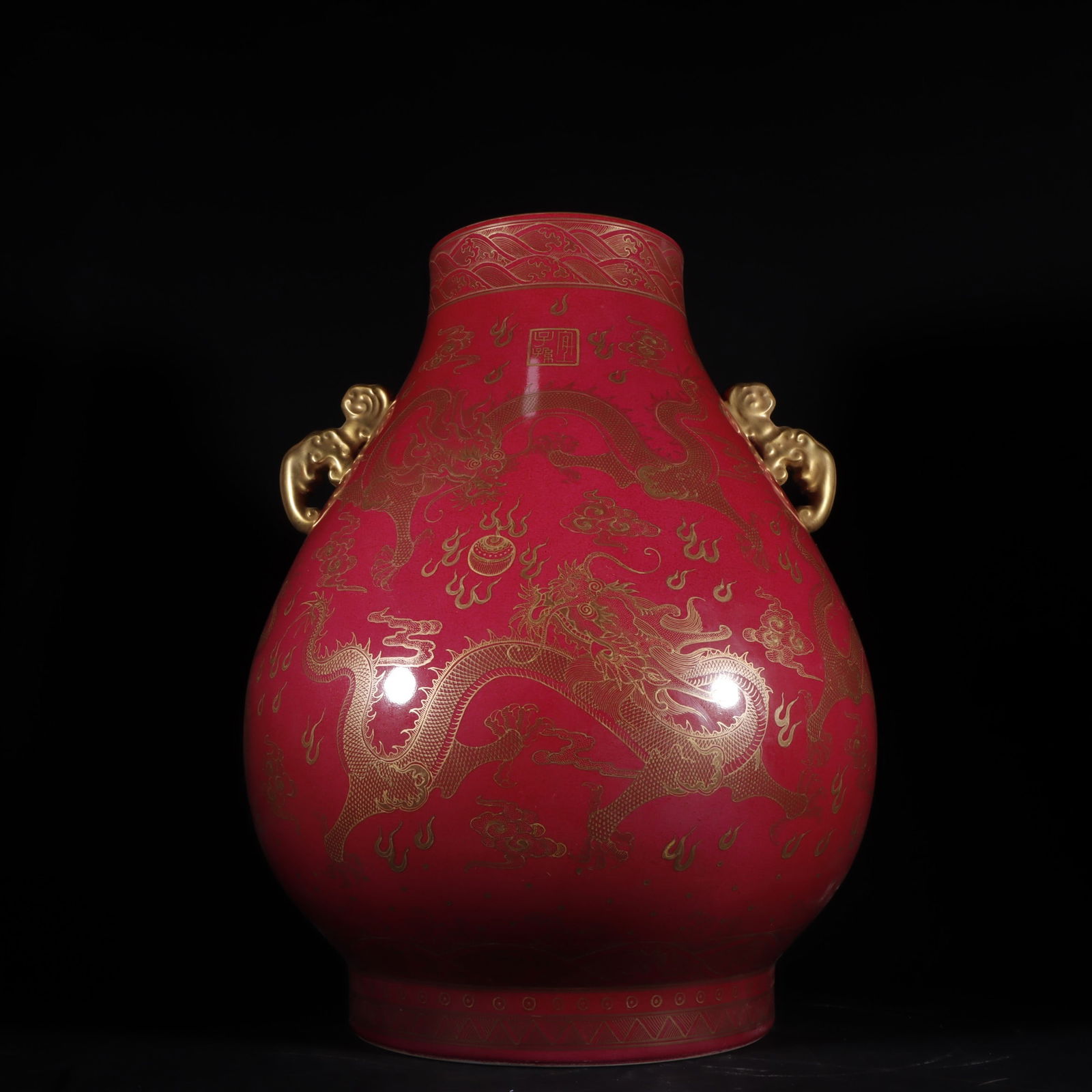 An Exquisite Red Glazed Painted Gold Dragon Pattern Double-Ears Vase: An Exquisite Red Glazed Painted Gold Dragon Pattern Double-Ears Vase Qing Dynasty, China Qianlong Six-character Mark Size:49cmx36cm (The Dimensions Of All Batches Are Manually Measured.If You Need