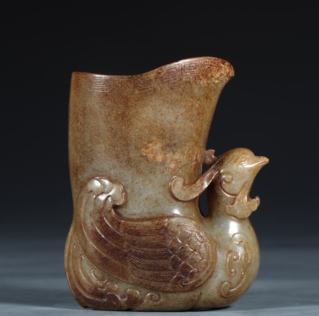 An Exquisite White Jade Phoenix-Shaped Goblet: An Exquisite White Jade Phoenix-Shaped Goblet Qing Dynasty, China Size:8.4cmx5.6cmx10.6cm Weight:423g (The Dimensions Of All Batches Are Manually Measured.If You Need More Detailed Information,