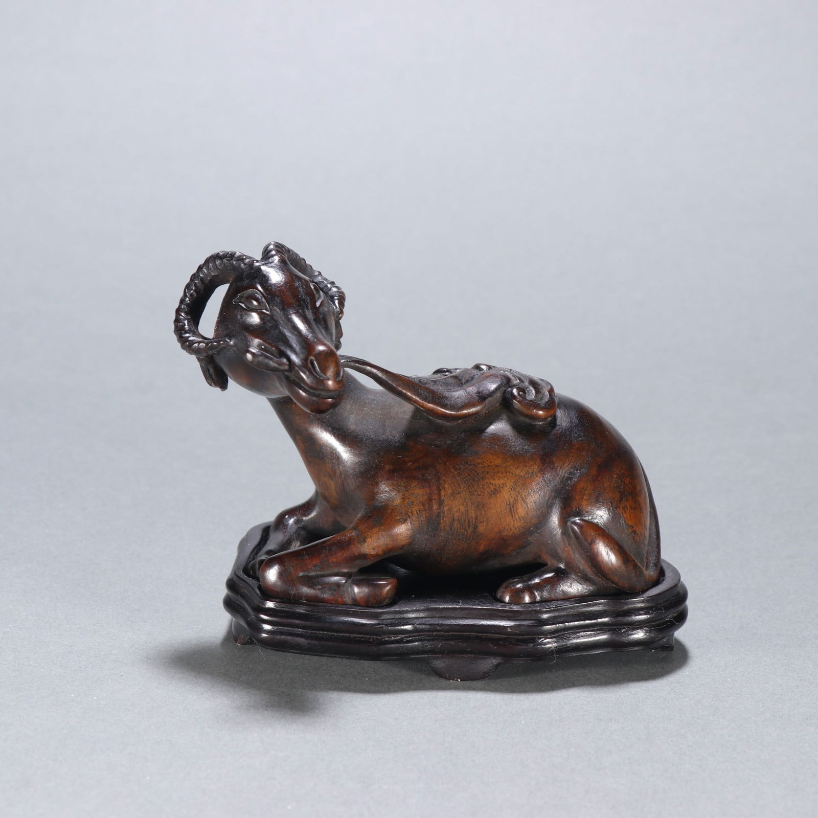 An Exquisite Eaglewood Sheep Ornament: An Exquisite Eaglewood Sheep Ornament Qing Dynasty, China Size:8.5cmx11.2cm Weight:118.7g (The Dimensions Of All Batches Are Manually Measured.If You Need More Detailed Information, Please Contact