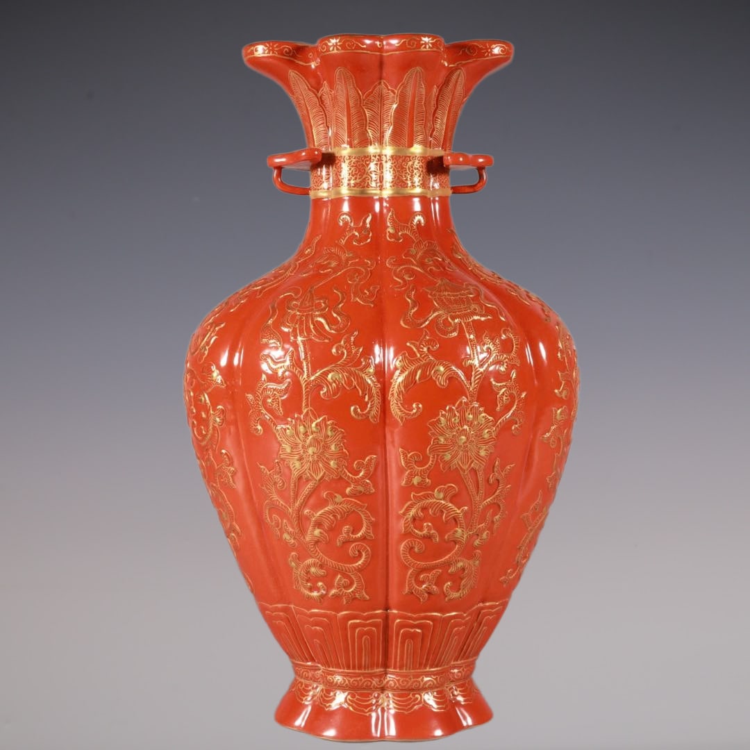 An Exquisite Iron-Red Painted Gold Lotus Pattern Double-Ears Vase: An Exquisite Iron-Red Painted Gold Lotus Pattern Double-Ears Vase Qing Dynasty, China Qianlong Six-character Mark Size:27.5cmx16cm (The Dimensions Of All Batches Are Manually Measured.If You Need