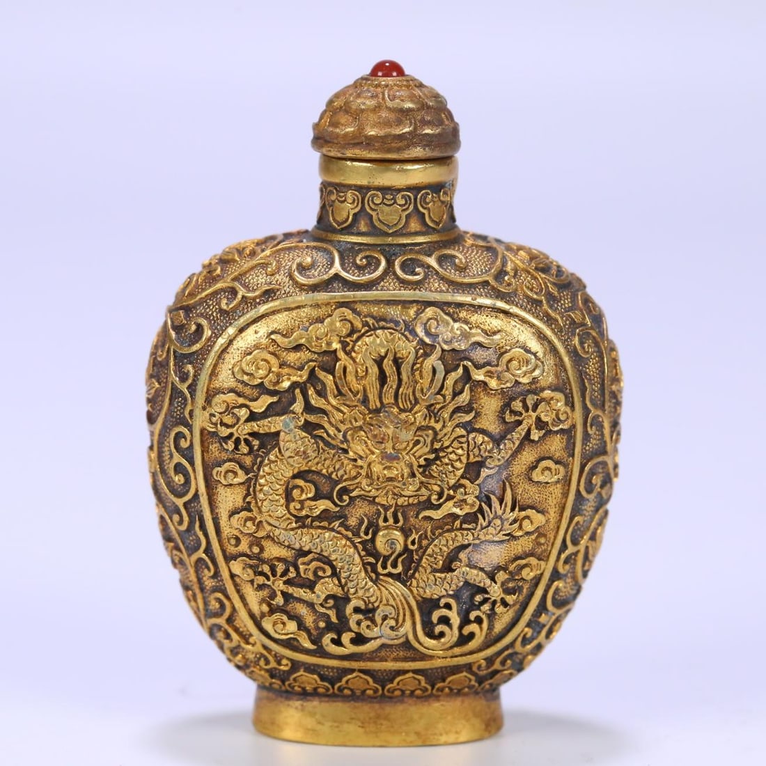 A fine copper gilt dragon pattern snuff bottle (1 of 9)