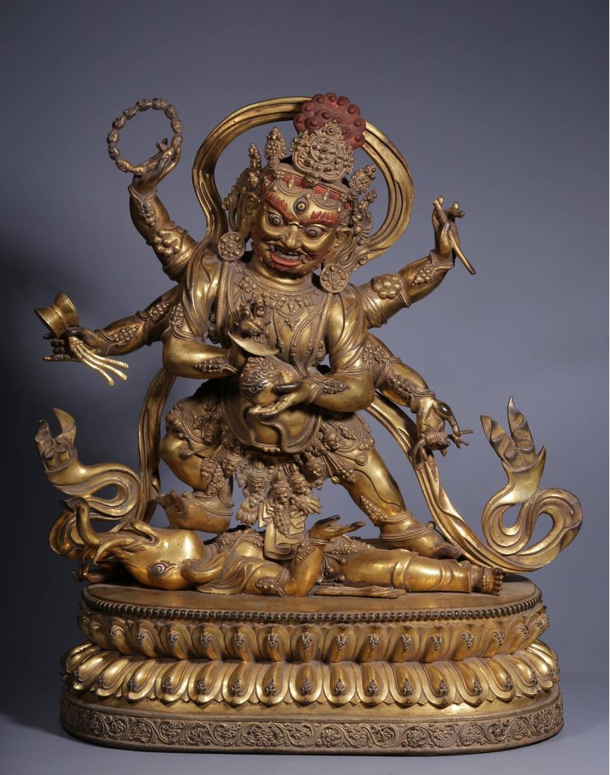 A bronze gilt six-armed Mahakala statue of the Qing Dynasty: The bronze gilt six-armed Mahakala statue of the Qing Dynasty Size: W:17kg H: 47cm L:41cmW:21.5cm (The Dimensions Of All Batches Are Manually Measured.If You Need More Detailed