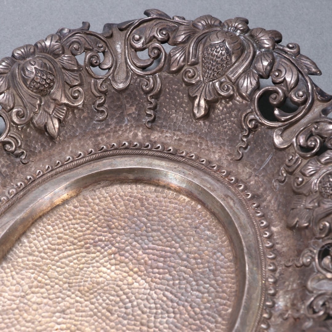 A fine sterling silver patterned plate - 6