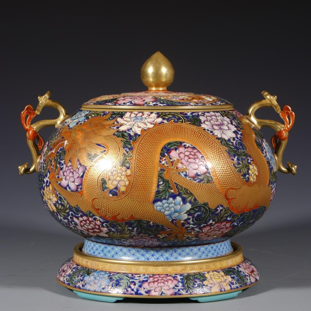 A Qing Dynasty Qianlong year enamel colorful dragon and phoenix auspicious three-section ruyi: Qing Dynasty Qianlong year enamel colorful dragon and phoenix auspicious three-section ruyi incense burner Size:H:24cmCalibre:14.5cmBottom:20cm (The Dimensions Of All Batches Are