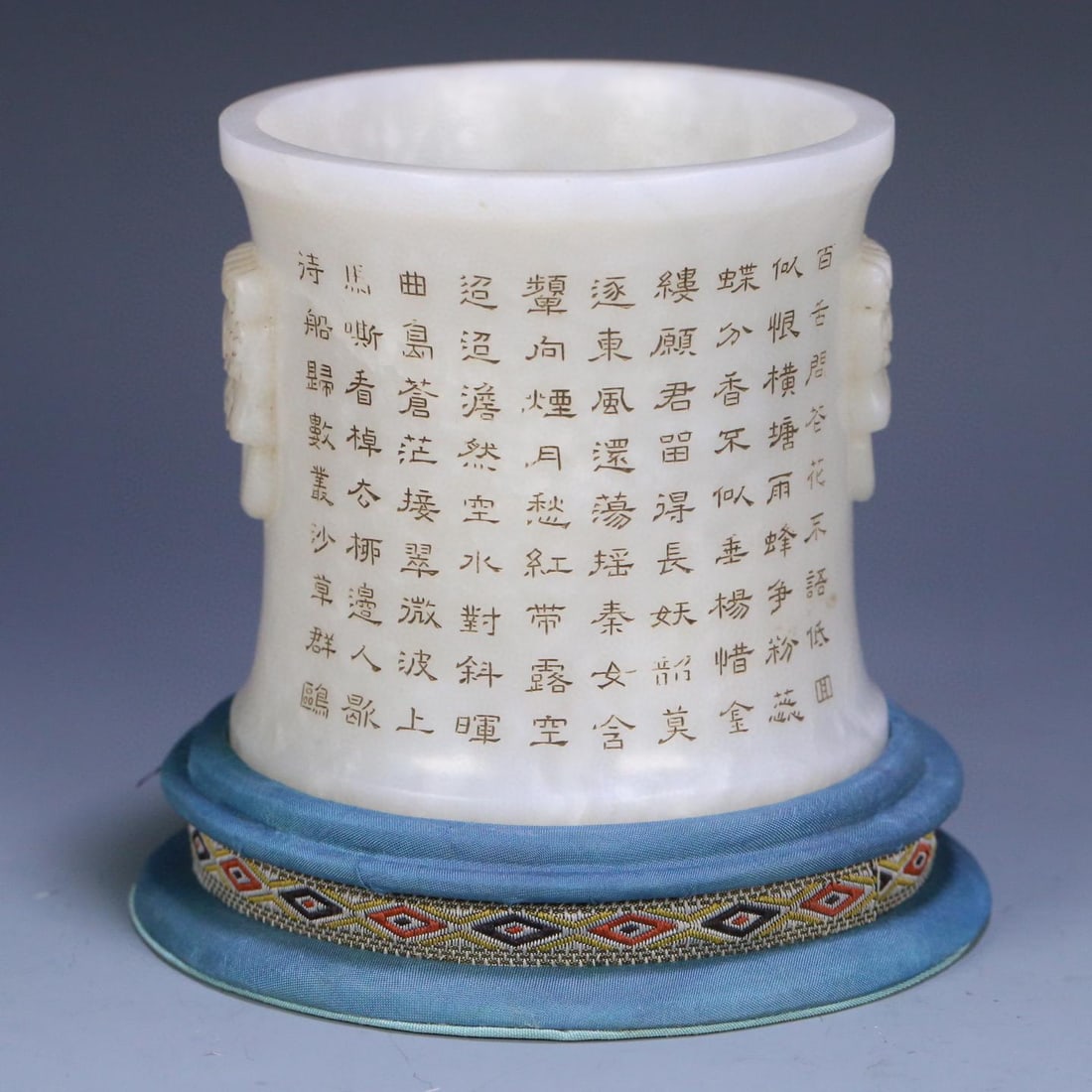 A Qing Dynasty Hetian jade double lion's ear poetry pen holder: Qing Dynasty's Hetian jade double lion's ear poetry pen holder Size:9.4x9.3cmW:0.5645kg (The Dimensions Of All Batches Are Manually Measured.If You Need More Detailed Information,