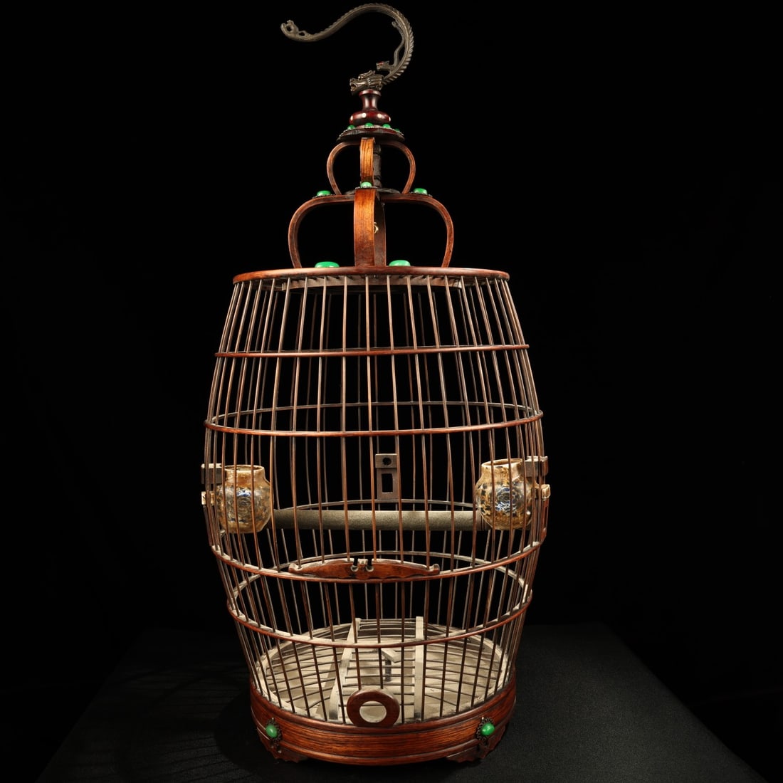 A fine wenge inlaid jeweled birdcage: Exquisite wenge inlaid gemstone birdcage Size:H:70cm W:32cm W:1.419kg (The Dimensions Of All Batches Are Manually Measured.If You Need More Detailed Information, Please Contact Our