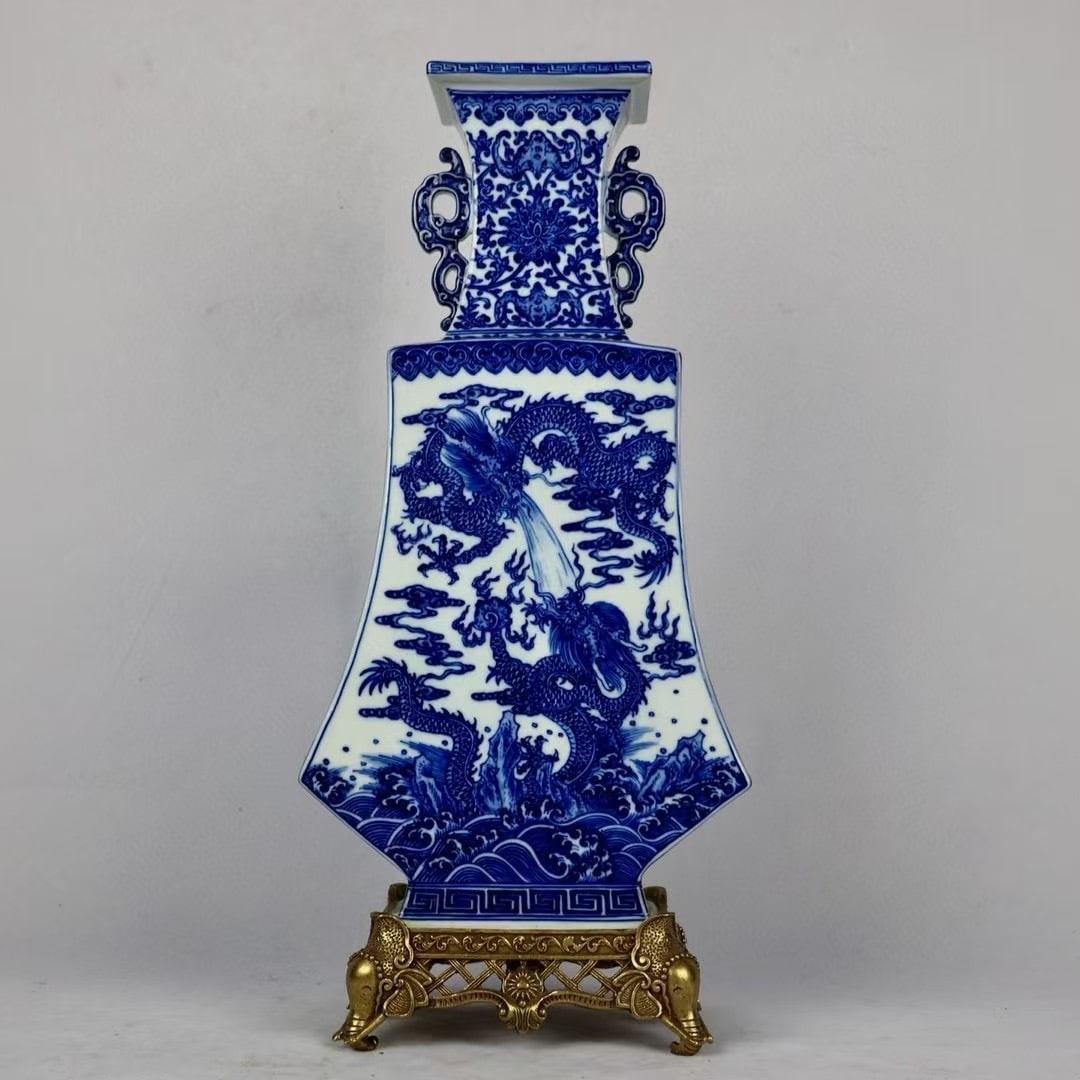 A beautiful copper-inlaid porcelain blue and white seawater dragon pattern square vase: Exquisite copper-inlaid porcelain blue and white seawater dragon pattern square vase Size:H:49.5cmCalibre:11.5cmD:22.5cmBottom:18cm (The Dimensions Of All Batches Are Manually