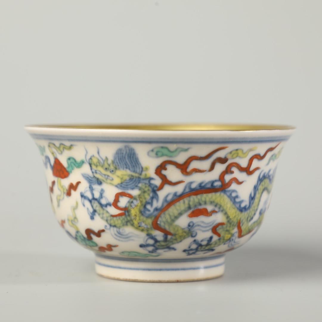 A Doucai cup made in the Chenghua year of the Ming Dynasty: The Doucai cup of the Ming Dynasty Chenghua year Size:H:4.5cm D:8.5cm (The Dimensions Of All Batches Are Manually Measured.If You Need More Detailed Information, Please Contact Our