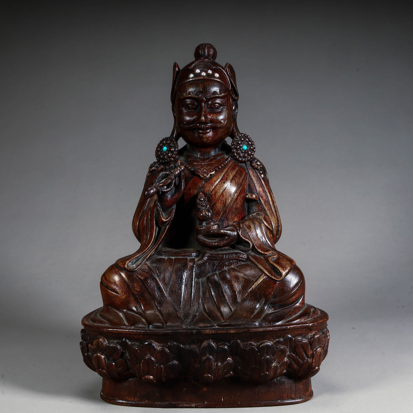 A statue of a master lotus peanut carved in agarwood from the Qing Dynasty: Qing Dynasty agarwood carving lotus peanut master statue Size:H:25cm L: 17cm W:11.5cm W:572g (The Dimensions Of All Batches Are Manually Measured.If You Need More Detailed