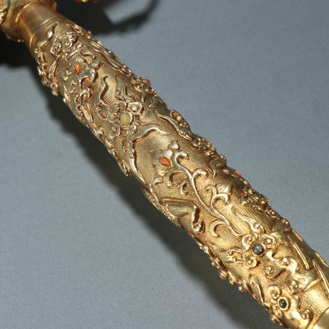 A fine copper-gilt diamond axe - 9