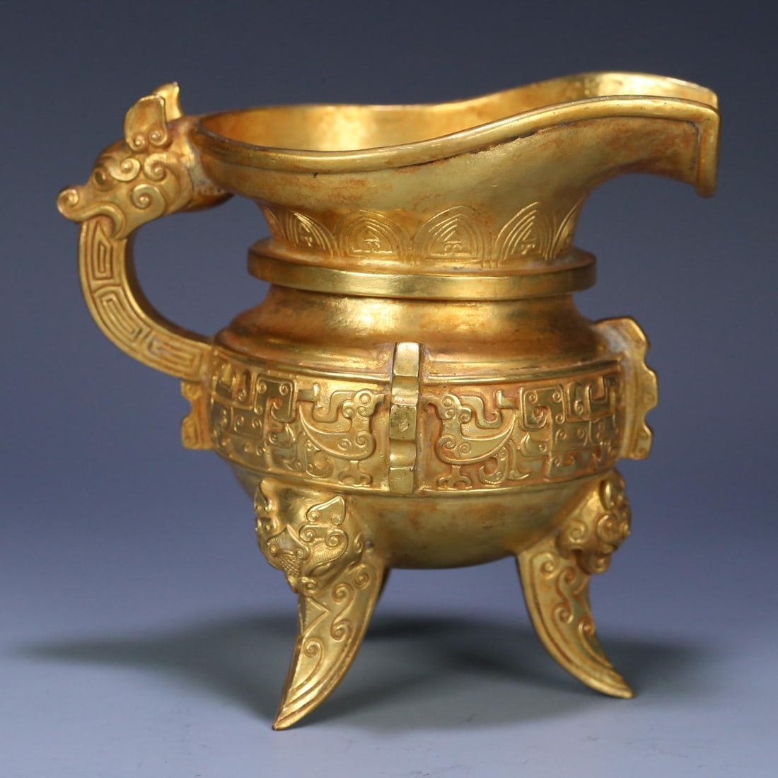 A fine copper-gilt ancient beast cup: Exquisite copper gilt ancient beast cup Size: W:0.6466kg13.4cmx9.9cmx12.7cm (The Dimensions Of All Batches Are Manually Measured.If You Need More Detailed Information, Please Contact Our Customer Serv