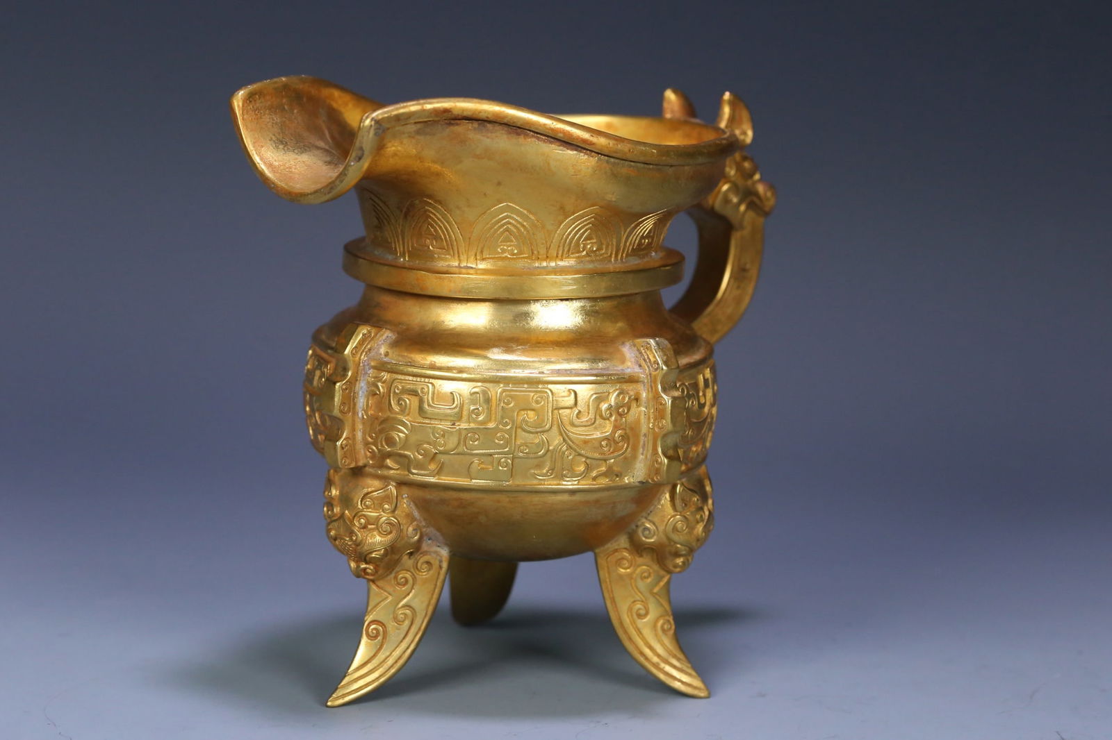 A fine copper-gilt ancient beast cup - 2