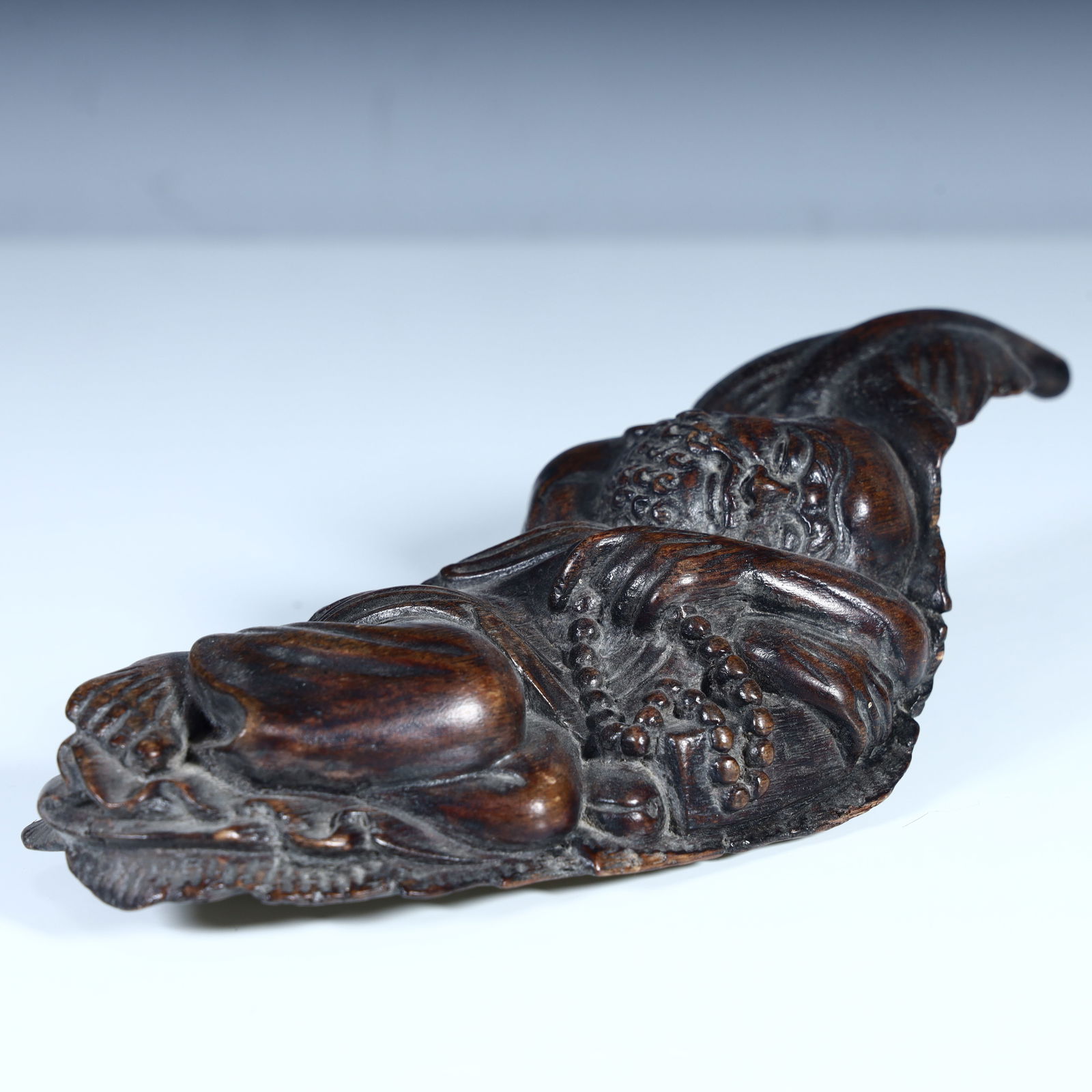 A fine agarwood dharma ornament from the Qing Dynasty (1 of 7)