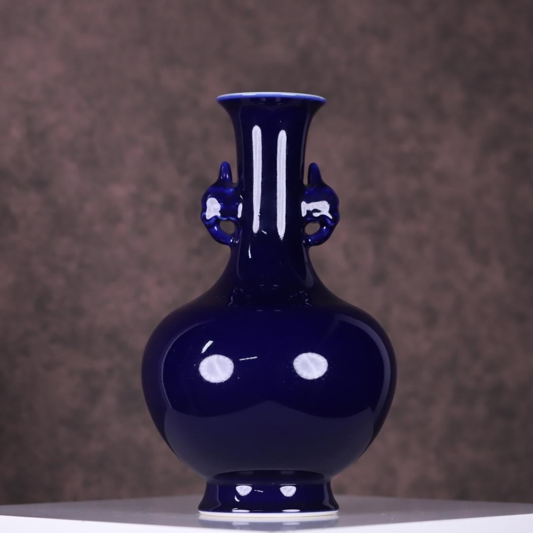 A blue glazed elephant ear appreciation bottle made in the Qianlong period of the Qing Dynasty: Qing Dynasty Qianlong year made of blue glazed elephant ear appreciation bottle Size:H:33cmx19cm (The Dimensions Of All Batches Are Manually Measured.If You Need More Detailed