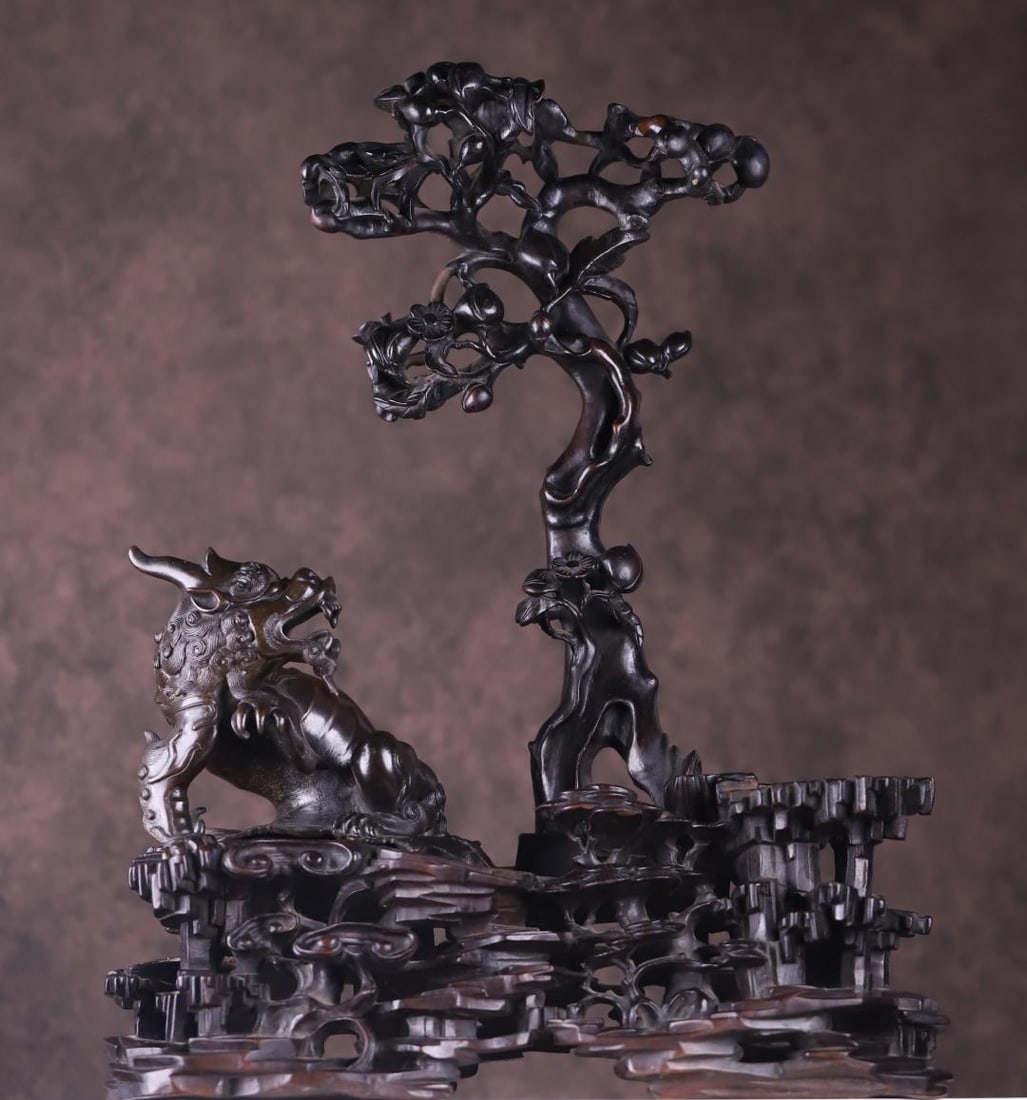 A Qing Dynasty rosewood inlaid copper beast ornament: Qing Dynasty rosewood inlaid copper auspicious beast ornaments Size:H:45cm W:43cm L: 19cm W:5.55kg (The Dimensions Of All Batches Are Manually Measured.If You Need More Detailed