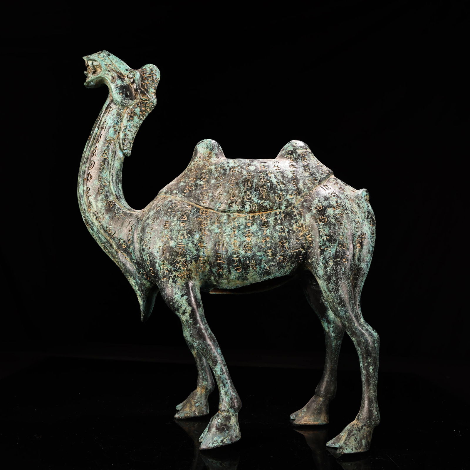 A fine bronze camel walking with inscription: Exquisite bronze camel walking with inscription Size:H:38cm L: 32cm W:3.85kg (The Dimensions Of All Batches Are Manually Measured.If You Need More Detailed Information, Please Contact Our Customer Ser