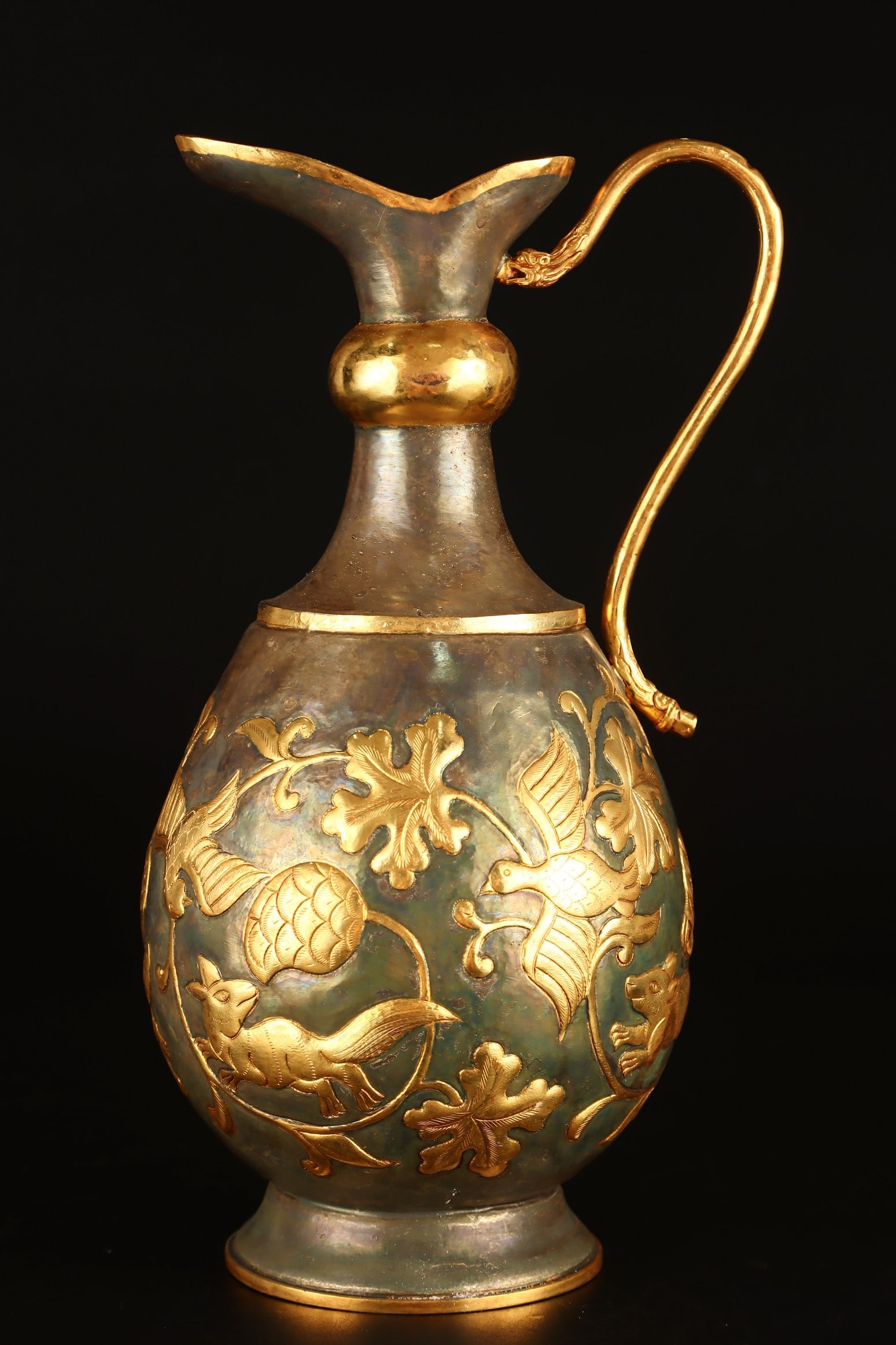 A partial gilt pot from the Tang Dynasty: Local gilt pot of the Tang Dynasty Size:H:26cm W:12cm W:0.749kg (The Dimensions Of All Batches Are Manually Measured.If You Need More Detailed Information, Please Contact Our