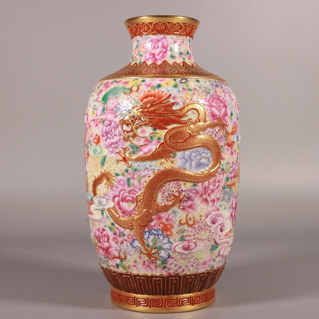 An Exquisite Famille-Rose Flower Pattern Dragon Pattern Vase: An Exquisite Famille-Rose Flower Pattern Dragon Pattern Vase Qing Dynasty, China Qianlong Six-character Mark Size:21.5cmx11.5cm (The Dimensions Of All Batches Are Manually Measured.If You Need More De