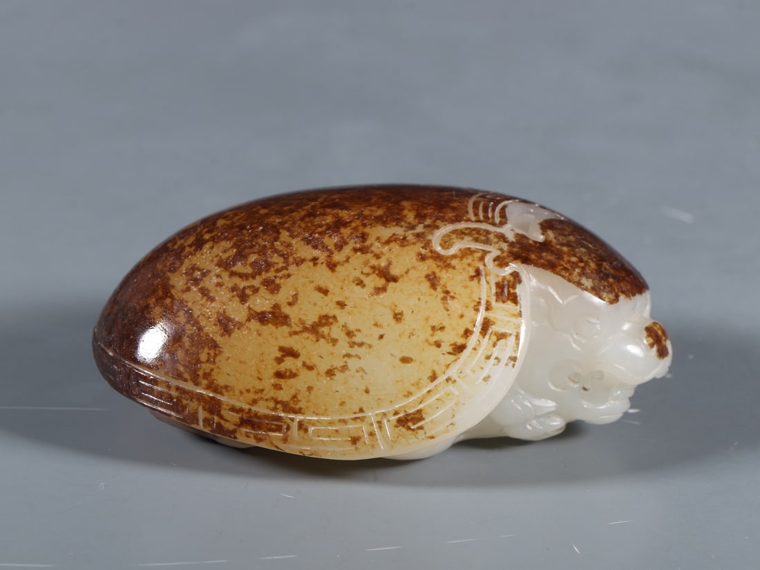 An Exquisite White Jade Auspicious Beast Ornament: An Exquisite White Jade Auspicious Beast Ornament Qing Dynasty, China Size:6cmx4.3cmx2.3cm Weight:87g (The Dimensions Of All Batches Are Manually Measured.If You Need More Detailed Information,