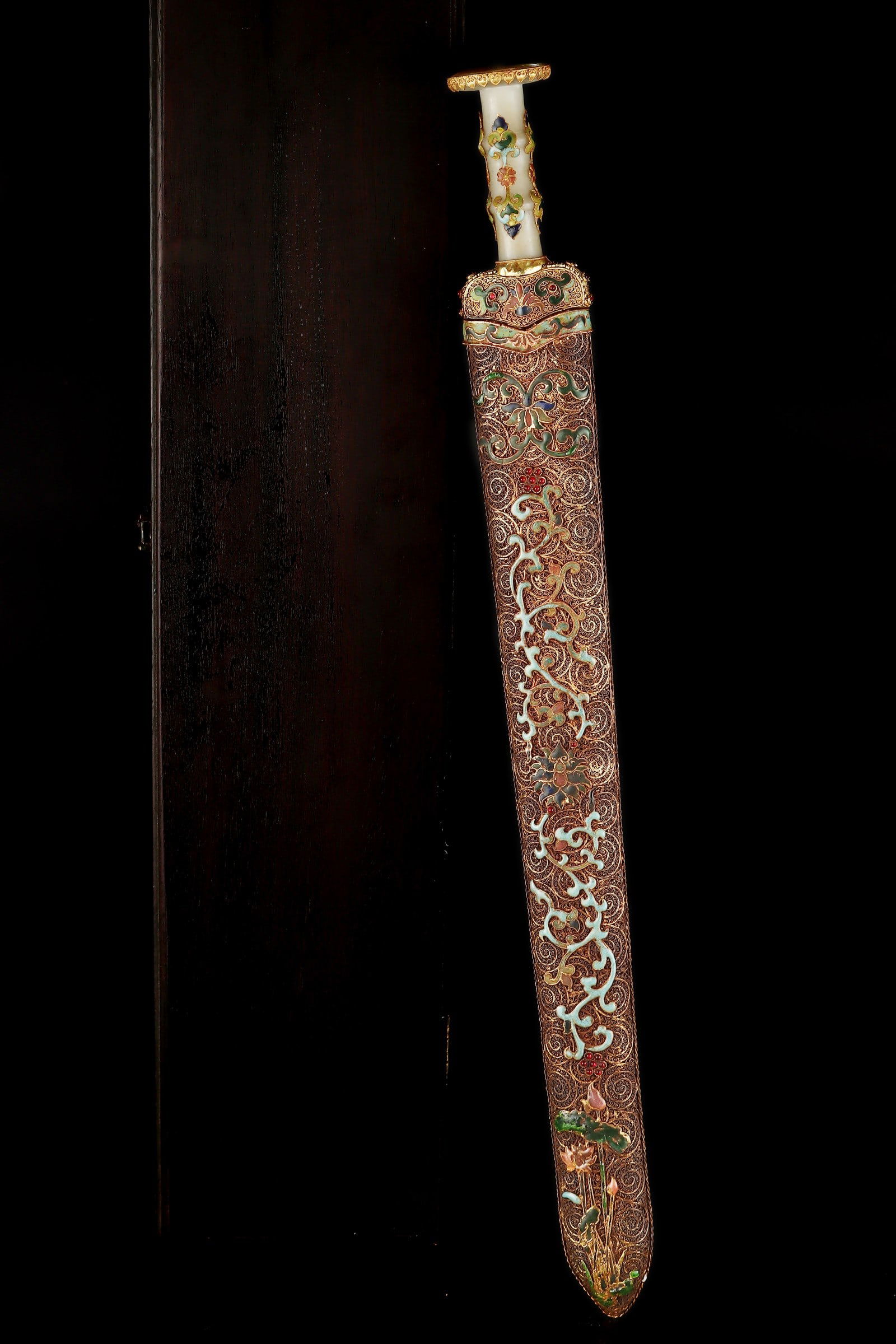 An Exquisite Gilt Bronze Inlaid White Jade Lotus Pattern with poem Sword: An Exquisite Gilt Bronze Inlaid White Jade Lotus Pattern with poem Sword Han Dynasty, China Size:66cmx7cm (The Dimensions Of All Batches Are Manually Measured.If You Need More Detailed Information,