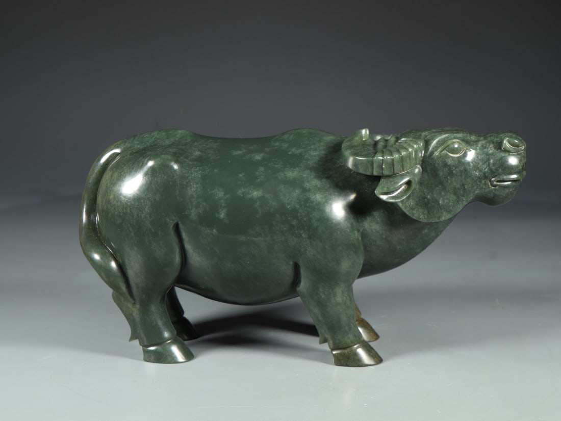 An Exquisite Jasper Buffalo Ornament: An Exquisite Jasper Buffalo Ornament Qing Dynasty, China Size:24cmx8.6cmx12.7cm Weight:3213g (The Dimensions Of All Batches Are Manually Measured.If You Need More Detailed Information, Please