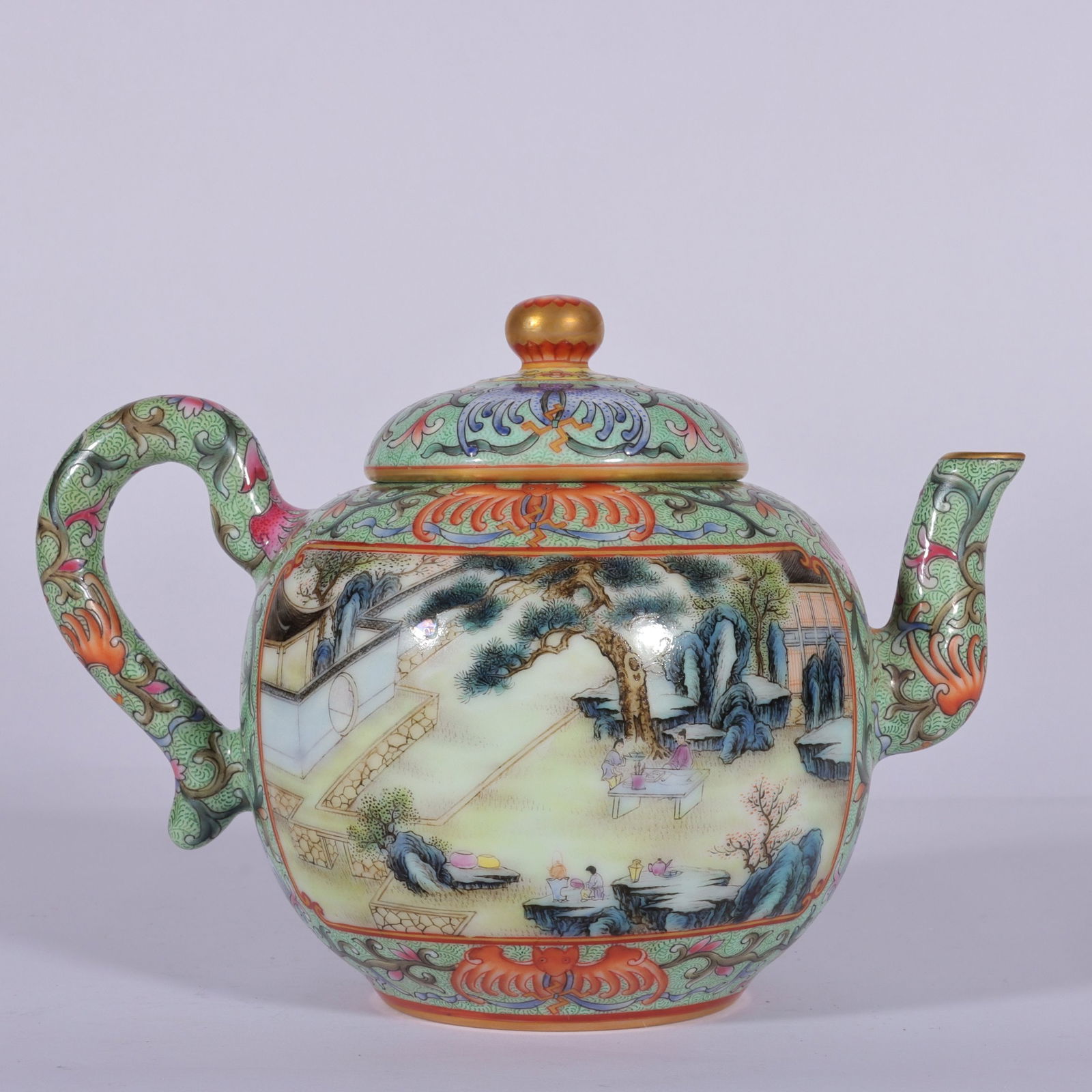 An Exquisite Famille-Rose Painted Gold Lotus Pattern Landscape and Figure Pattern with poem Teapot: An Exquisite Famille-Rose Painted Gold Lotus Pattern Landscape and Figure Pattern with poem Teapot Qing Dynasty, China Qianlong Six-character Mark Size:14cmx7cm (The Dimensions Of All Batches Are