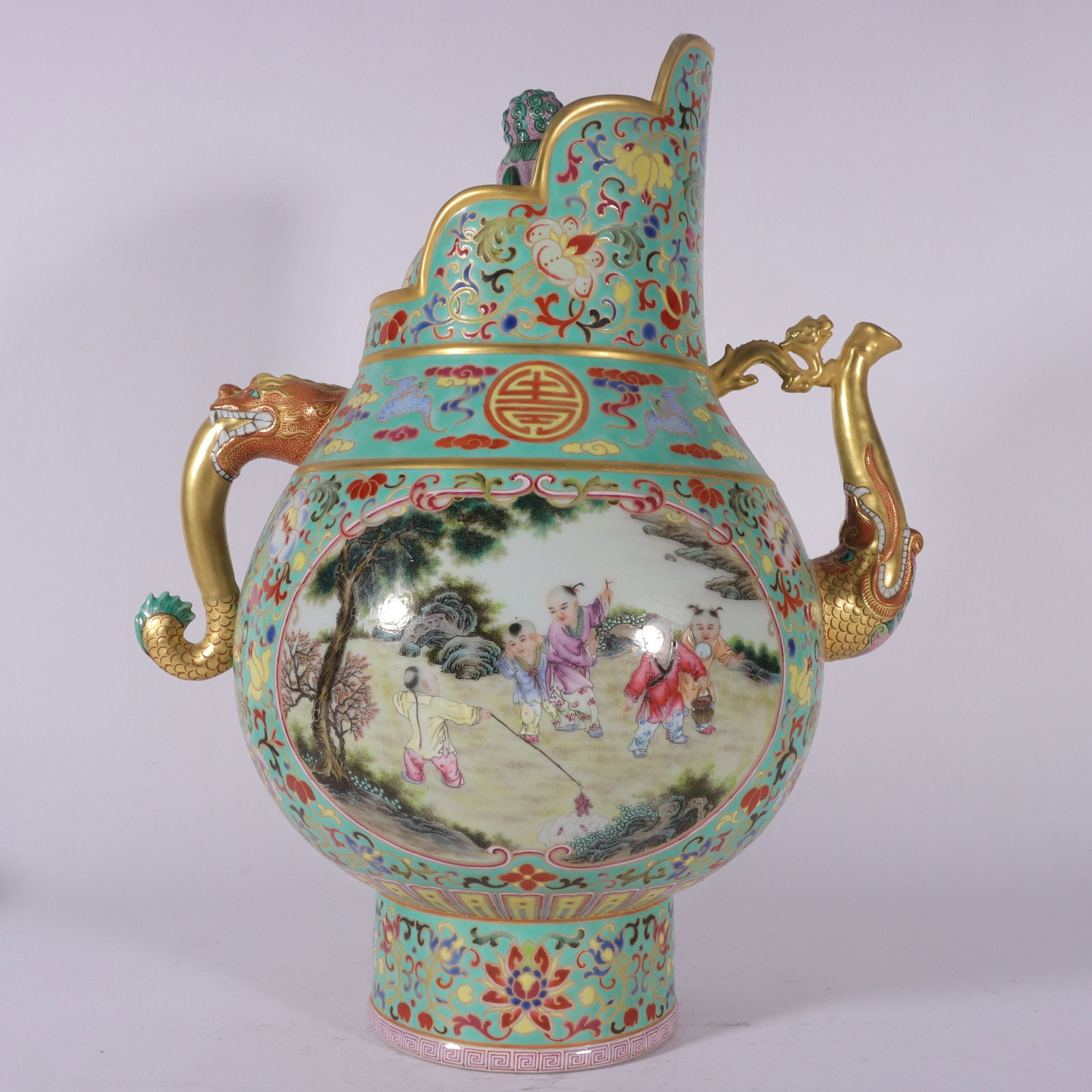 An Exquisite Enamel Painted Gold Lotus Pattern Bats and Peach Pattern Character and Story Pattern: An Exquisite Enamel Painted Gold Lotus Pattern Bats and Peach Pattern Character and Story Pattern Ewer Qing Dynasty, China Qianlong Four-character Mark Size:42cmx22cm (The Dimensions Of All Batches