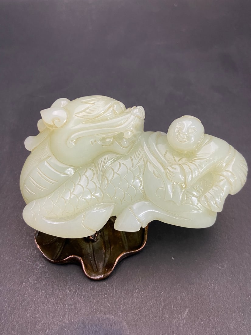 An Exquisite White Jade Kylin Hand Piece: An Exquisite White Jade Kylin Hand Piece Ming Dynasty, China Size:91.6mmx60mmx37.6mm Weight:261g (The Dimensions Of All Batches Are Manually Measured.If You Need More Detailed Information, Please