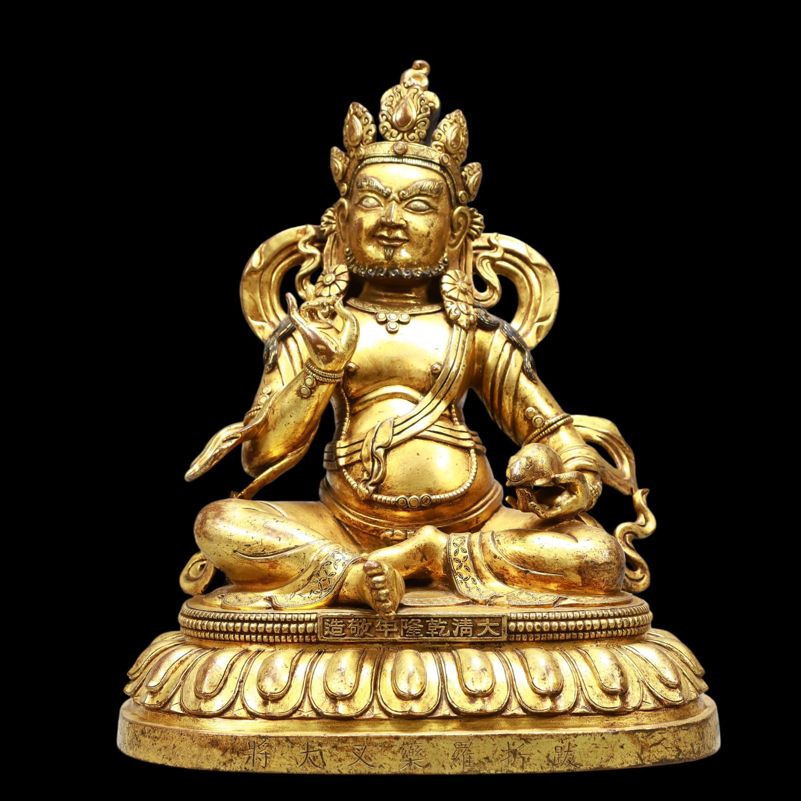 A Exquisite Gilt Bronze Statue of Mammon: A Exquisite Gilt Bronze Statue of Mammon Qing Dynasty, China Qianlong Six-character Mark Size:25cmx18.5cmx29cm Weight:5950g (The Dimensions Of All Batches Are Manually Measured.If You Need More