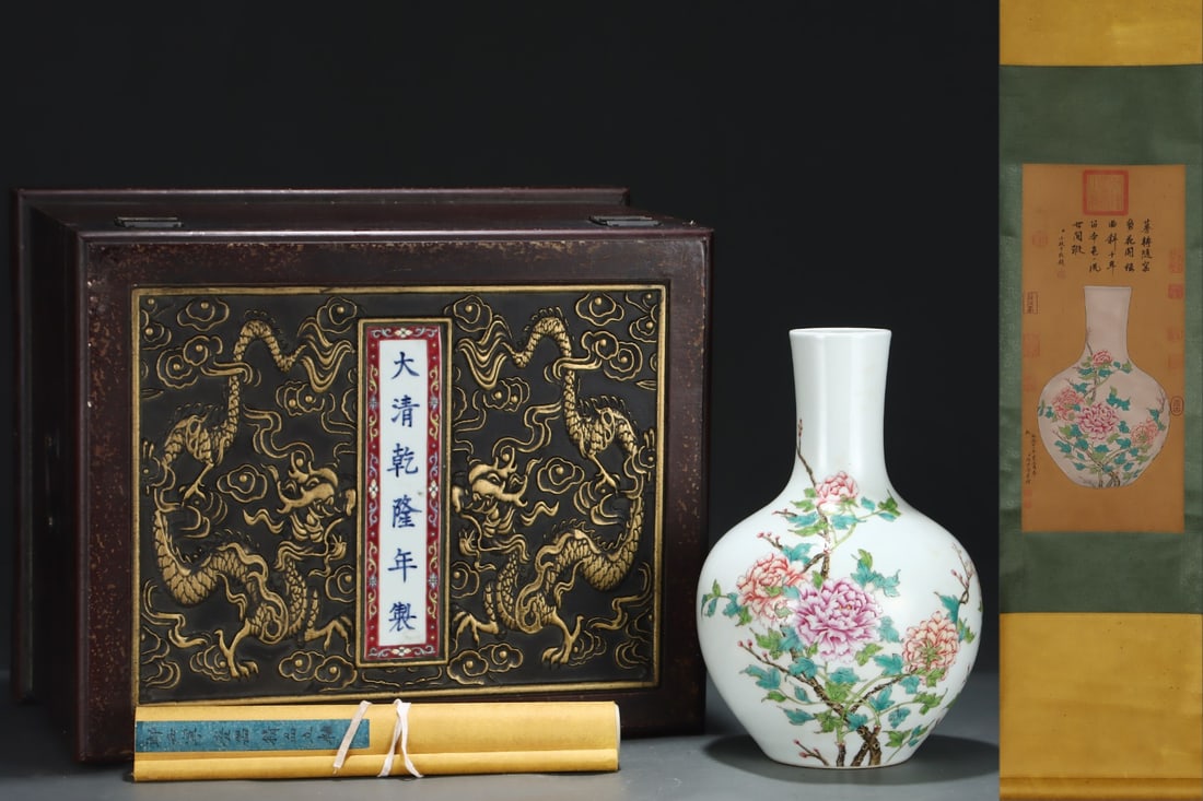 An Exquisite Famille-Rose Flower Pattern with poem Vase: An Exquisite Famille-Rose Flower Pattern with poem Vase Qing Dynasty, China Qianlong Six-character Mark Size:33.2cmx21cm Without frame Size:62cmx27.5cm (The Dimensions Of All Batches Are Manually