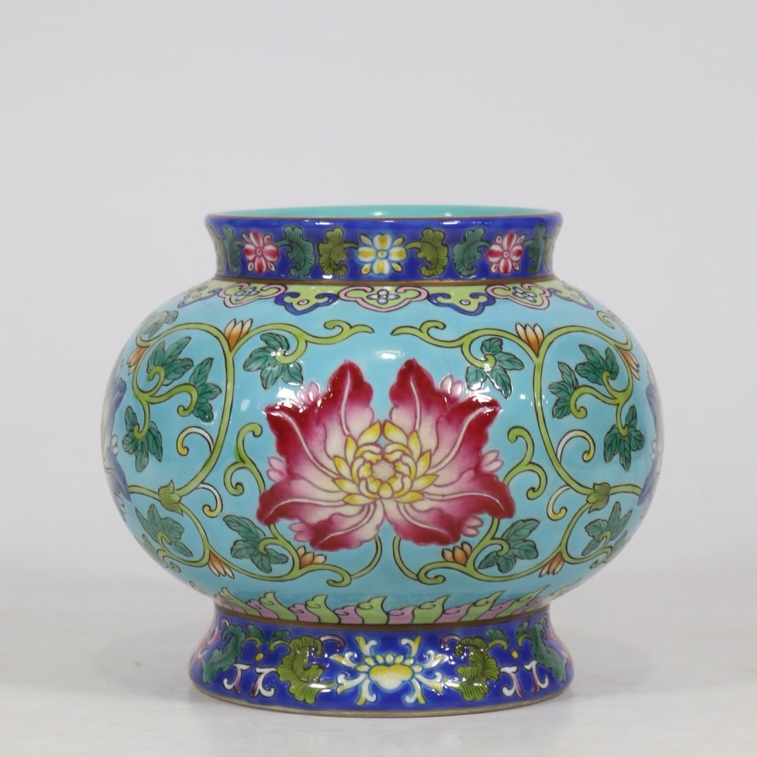 An Exquisite Famille-Rose Green Ground Lotus Pattern Jar: An Exquisite Famille-Rose Green Ground Lotus Pattern Jar Qing Dynasty, China Kangxi Four-character Mark Size:13cmx14.5cm (The Dimensions Of All Batches Are Manually Measured.If You Need More