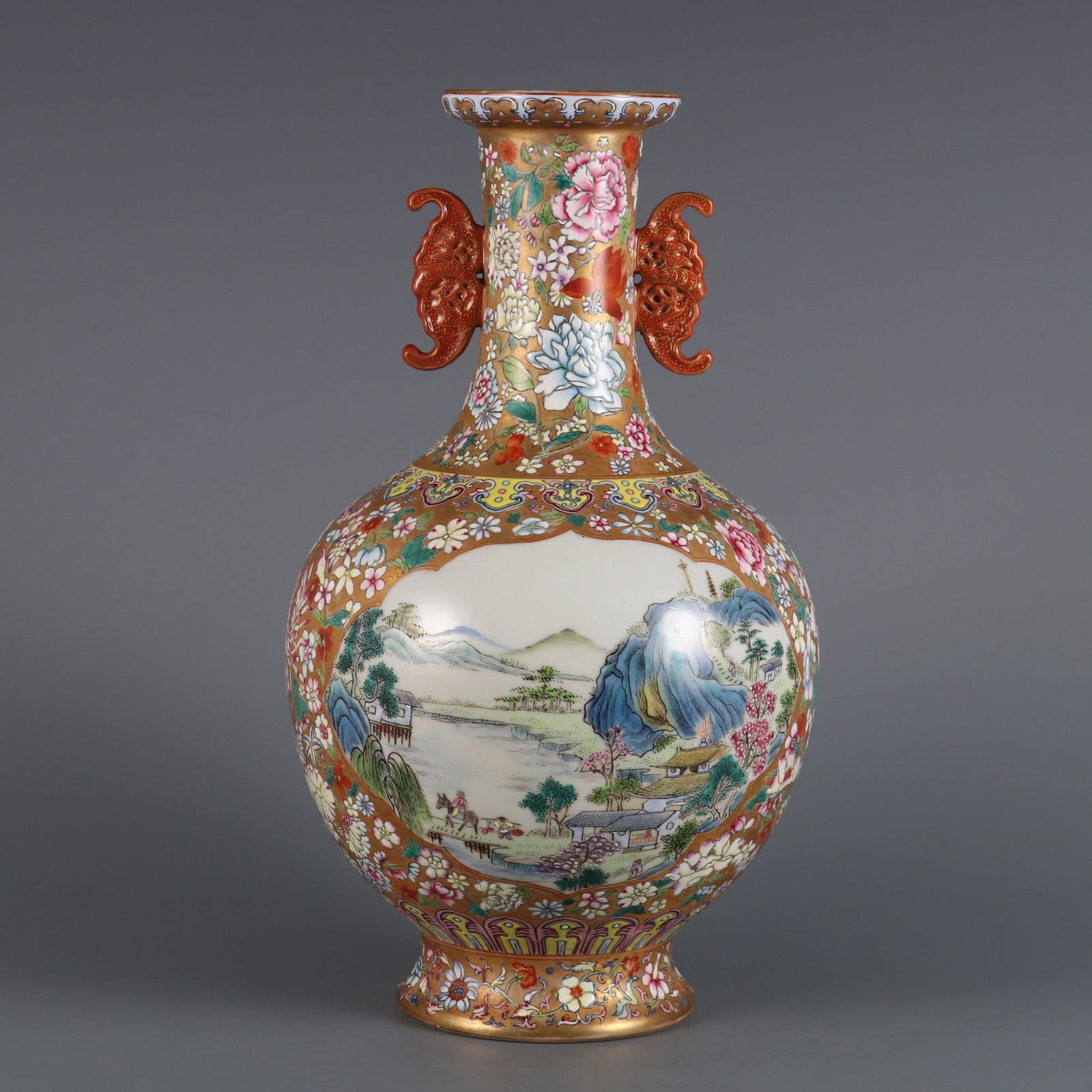 An Exquisite Famille-Rose Flower Pattern Landscape and Figure Pattern Double-Ears Vase: An Exquisite Famille-Rose Flower Pattern Landscape and Figure Pattern Double-Ears Vase Qing Dynasty, China Qianlong Six-character Mark Size:29.5cmx17cm (The Dimensions Of All Batches Are Manually
