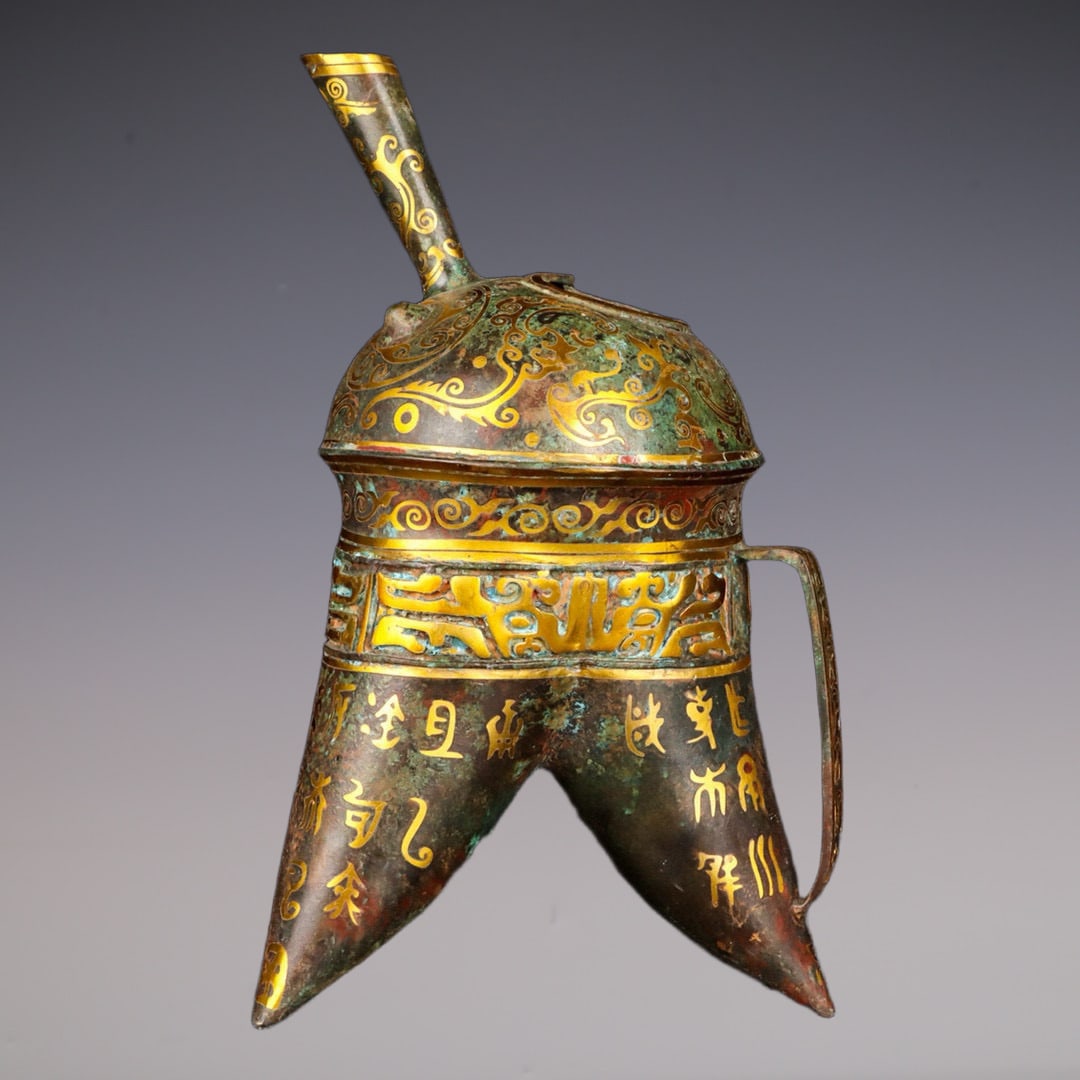 An Exquisite Bronze Inlaid Gold With Inscription Ewer: An Exquisite Bronze Inlaid Gold With Inscription Ewer Han Dynasty, China Size:17cmx26cm Weight:1415g (The Dimensions Of All Batches Are Manually Measured.If You Need More Detailed Information,