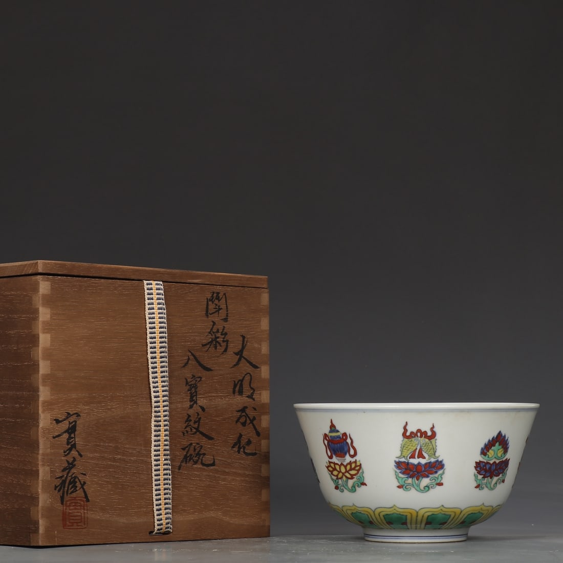 An Exquisite Doucai Eight Treasures Pattern Bowl: An Exquisite Doucai Eight Treasures Pattern Bowl Ming Dynasty, China Chenghua Six-character Mark Size:9cmx16.5cm (The Dimensions Of All Batches Are Manually Measured.If You Need More Detailed Informat