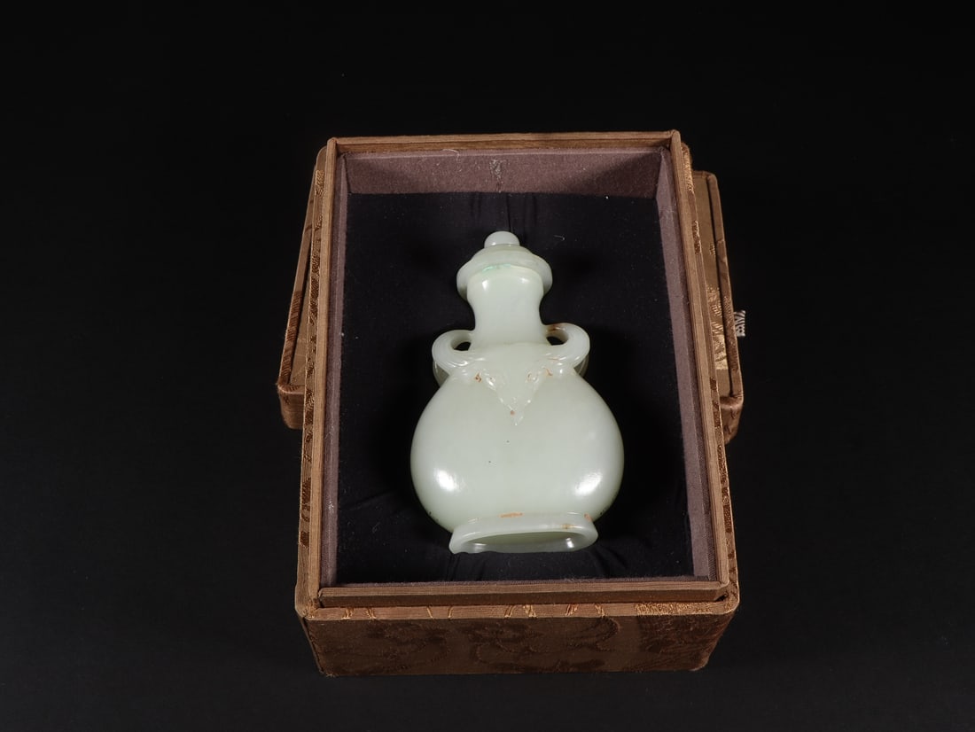 An Exquisite White Jade Beast-Face Pattern with poem Double-Ears Vase: An Exquisite White Jade Beast-Face Pattern with poem Double-Ears Vase Qing Dynasty, China Size:6.3cmx3.4cmx10.6cm Weight:150g (The Dimensions Of All Batches Are Manually Measured.If You Need More