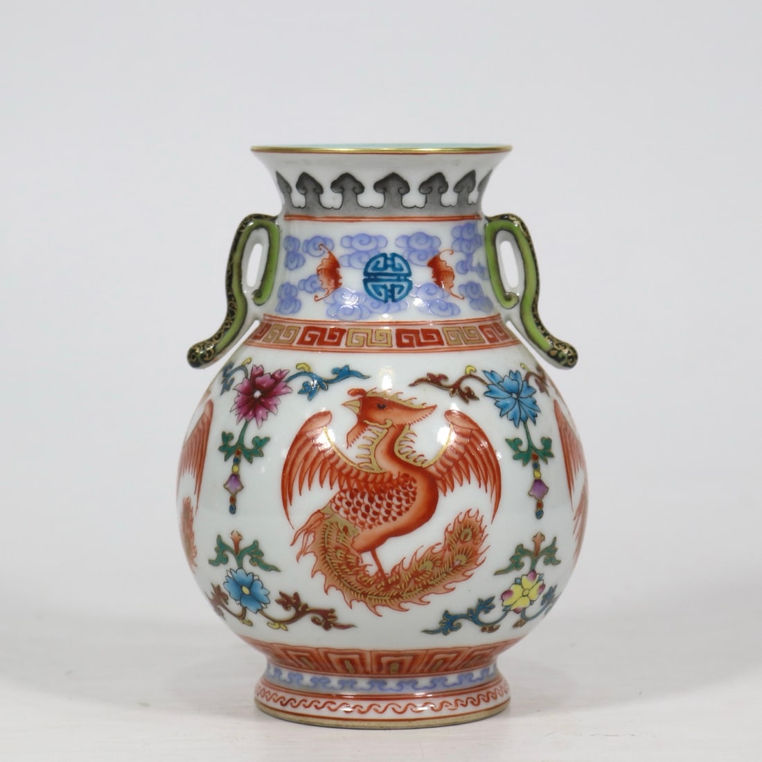An Exquisite Iron-Red Phoenix Pattern Bats and Peach Pattern Double-Ears Vase: An Exquisite Iron-Red Phoenix Pattern Bats and Peach Pattern Double-Ears Vase Qing Dynasty, China Qianlong Four-character Mark Size:13.5cmx10cm (The Dimensions Of All Batches Are Manually