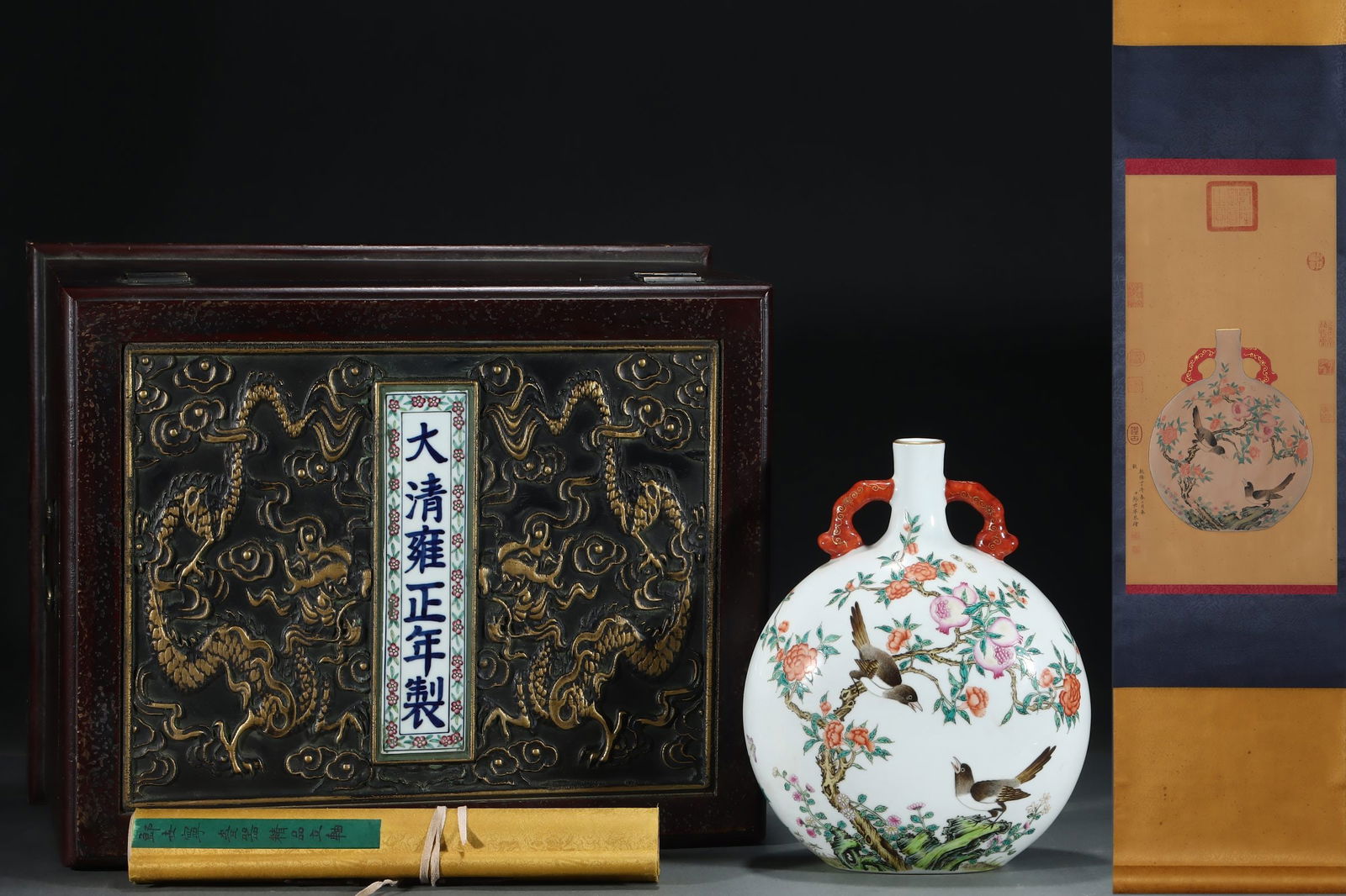 An Exquisite Famille-Rose Painted Gold Flower and Bird Pattern Double-EarsVase: An Exquisite Famille-Rose Painted Gold Flower and Bird Pattern Double-EarsVase Qing Dynasty, China Yongzheng Six-character Mark Without frame Size:62cmx32cm Size:30cmx24.2cm (The Dimensions Of All