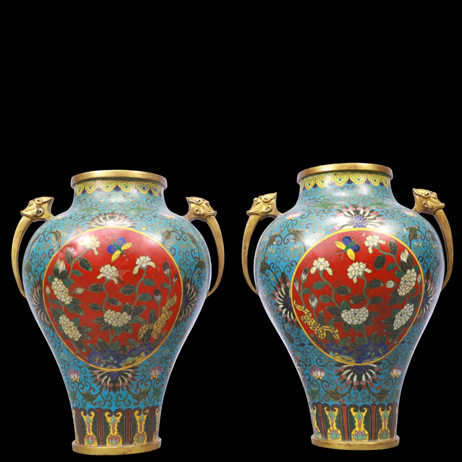 A Exquisite A pair of Cloisonne Lotus Pattern Flower and Butterfly Pattern Double-Ears Vase: A Exquisite A pair of Cloisonne Lotus Pattern Flower and Butterfly Pattern Double-Ears Vase Qing Dynasty, China Qianlong Four-character Mark Size:17cmx22cm Weight:2350g (The Dimensions Of All