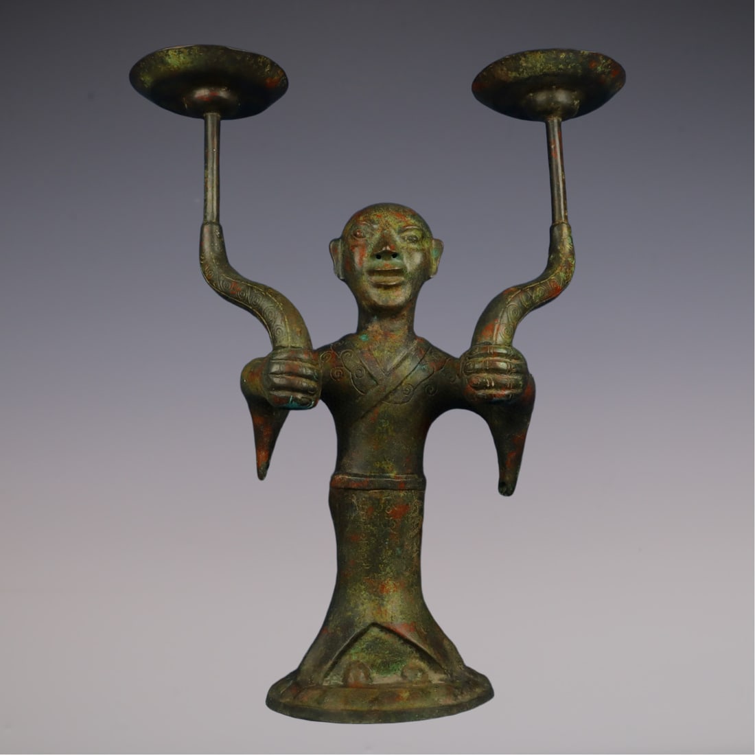 An Exquisite Bronze Figure-Shaped Candlestick: An Exquisite Bronze Figure-Shaped Candlestick Han Dynasty, China Size:67cmx30cmx82cm Weight:13750g (The Dimensions Of All Batches Are Manually Measured.If You Need More Detailed Information, Please Co