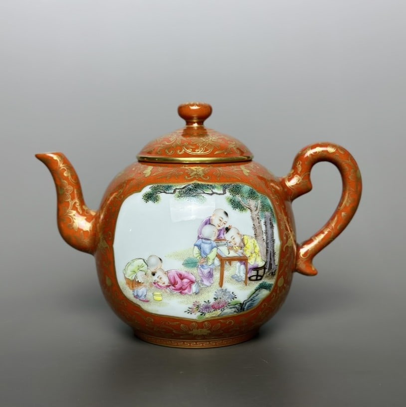An Exquisite Iron-Red Painted Gold Lotus Pattern Character and Story Pattern Teapot: An Exquisite Iron-Red Painted Gold Lotus Pattern Character and Story Pattern Teapot Qing Dynasty, China Qianlong Six-character Mark Size:12.5cmx10.2cm (The Dimensions Of All Batches Are Manually