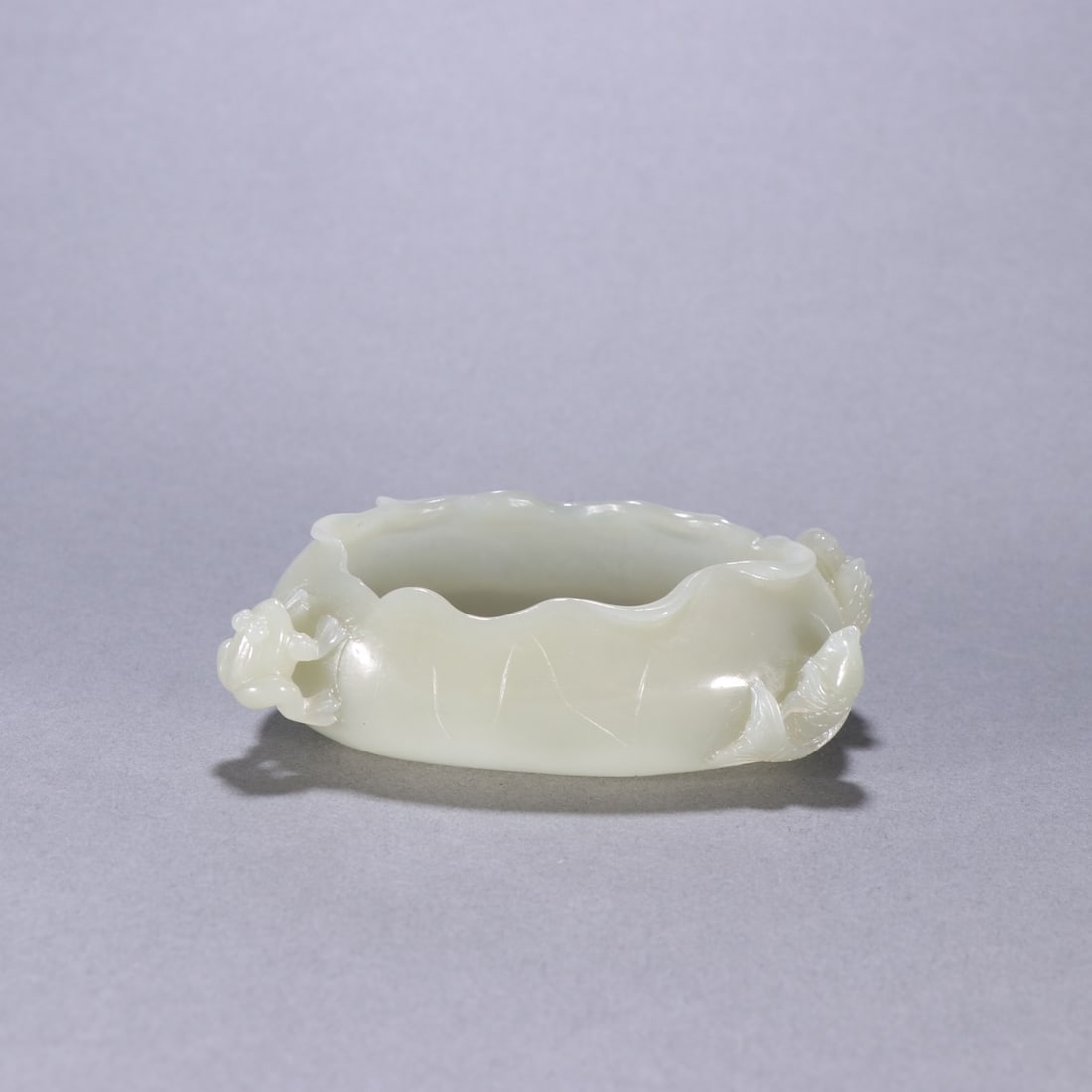 An Exquisite White Jade Animal Pattern Lotus Leaf-Shaped Brush Washer (1 of 9)