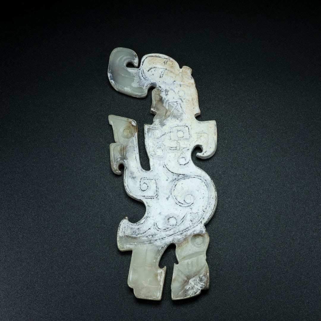 An Exquisite White Jade Bird Ornament: An Exquisite White Jade Bird Ornament S.Zhou , China Size:12.5cmx5.3cmx0.5cm Weight:68g (The Dimensions Of All Batches Are Manually Measured.If You Need More Detailed Information, Please Contact
