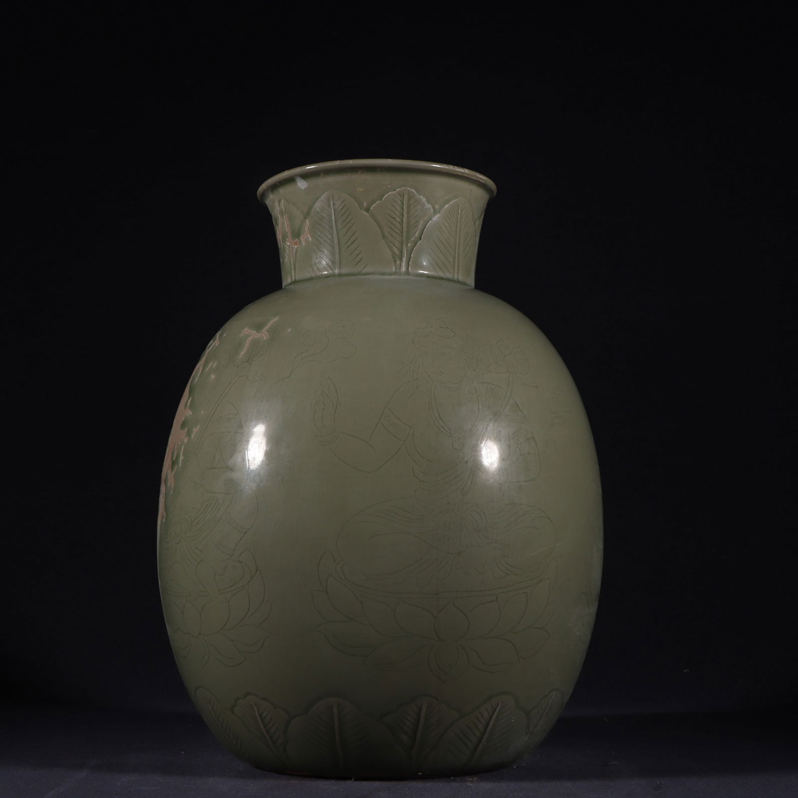 An Exquisite Yue yao Celadon Figure Pattern Jar: An Exquisite Yue yao Celadon Figure Pattern Jar Tang Dynasty, China Size:27cmx20cm (The Dimensions Of All Batches Are Manually Measured.If You Need More Detailed Information, Please Contact Our