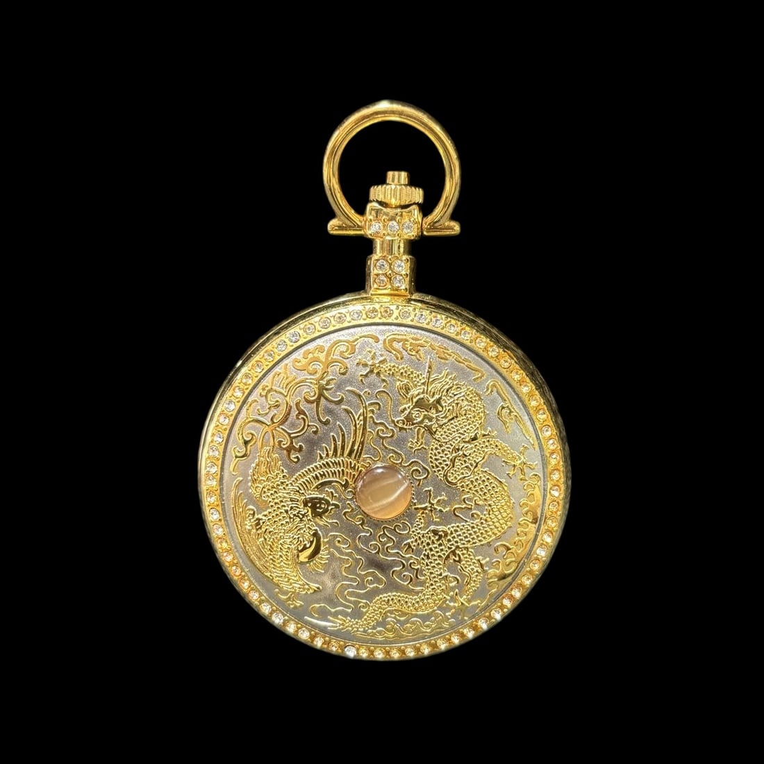 An Exquisite Gilt Bronze Dragon and Phoenix Pattern Pocket watch: An Exquisite Gilt Bronze Dragon and Phoenix Pattern Pocket watch Qing Dynasty, China Size:5cm (The Dimensions Of All Batches Are Manually Measured.If You Need More Detailed Information, Please