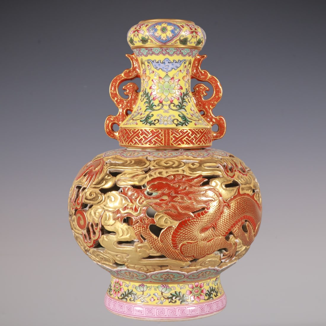 An Exquisite Enamel Lotus Pattern Dragon Pattern Bats and Peach Pattern Double-Ears Vase: An Exquisite Enamel Lotus Pattern Dragon Pattern Bats and Peach Pattern Double-Ears Vase Qing Dynasty, China Qianlong Four-character Mark Size:25.5cmx19cm (The Dimensions Of All Batches Are
