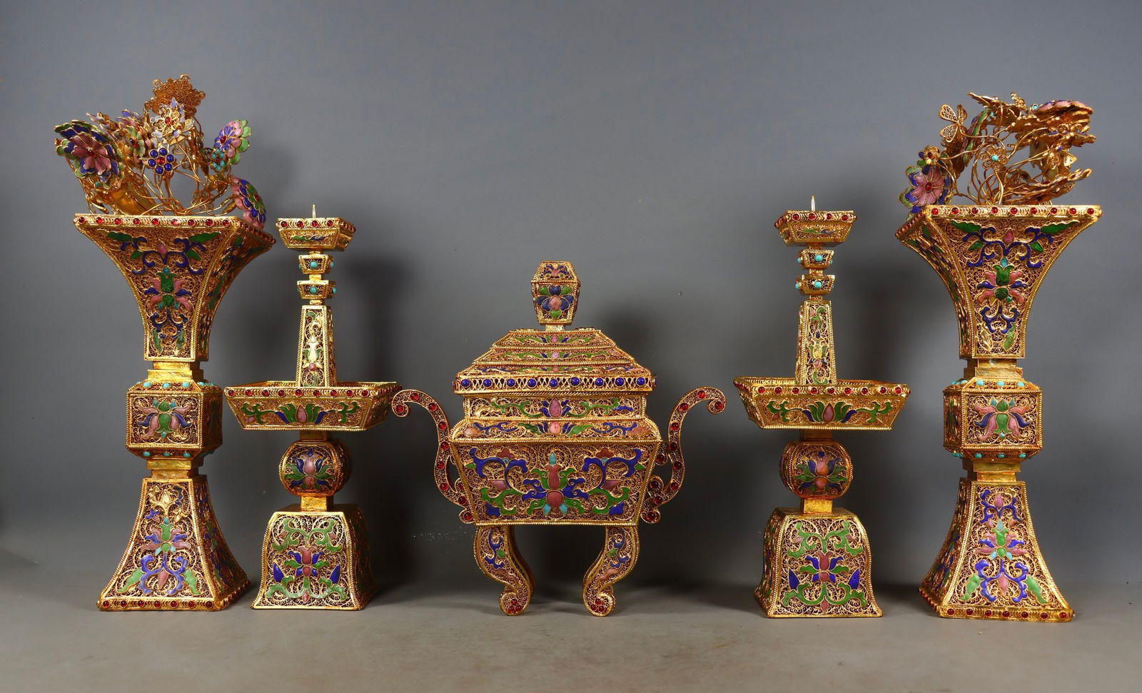 A Set of Fine Gilt Bronze Inlaid Gems Lotus Pattern Double-Ears Censer Candlestick: A Set of Fine Gilt Bronze Inlaid Gems Lotus Pattern Double-Ears Censer Candlestick Qing Dynasty, China Qianlong Four-character Mark Size:24cmx21cmx9.5cm Size:28cmx10.5cm Size:36.5cmx11cm Weight:4010g