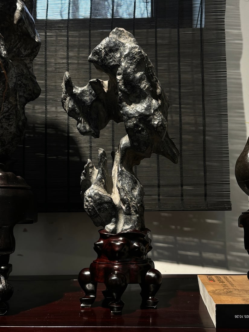 An Exquisite Lingbi Stone Ornament: An Exquisite Lingbi Stone Ornament Qing Dynasty, China Size:46cmx44cmx20cmx12cm (The Dimensions Of All Batches Are Manually Measured.If You Need More Detailed Information, Please Contact Our