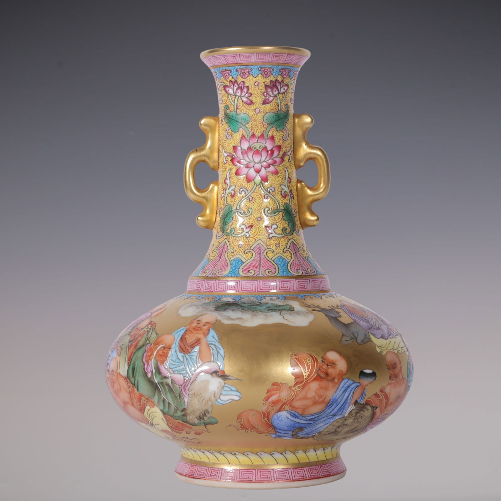 An Exquisite Enamel Lotus Pattern Character and Story Pattern Double-Ears Vase: An Exquisite Enamel Lotus Pattern Character and Story Pattern Double-Ears Vase Qing Dynasty, China Qianlong Six-character Mark Size:16cmx11cm (The Dimensions Of All Batches Are Manually Measured.If